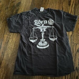 Black t-shirt with Libra zodiac sign on the front